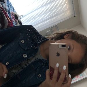 A jean jacket with studs